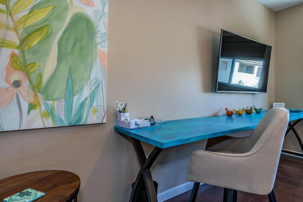 8' long custom desk with teal and green weathered paint.