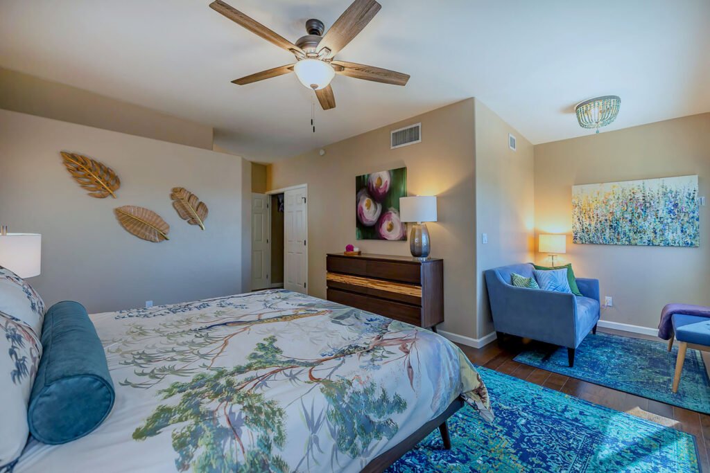 Primary Bedroom with rich wood tones.