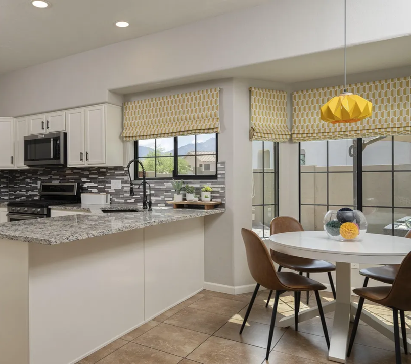 funky yellow pendant in breakfast nook