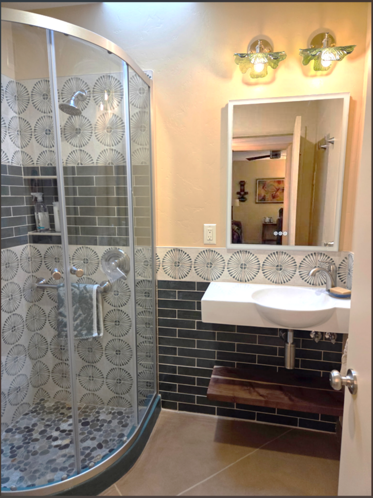Hall Bath AFTER green white tile, wall mount sink and corner shower